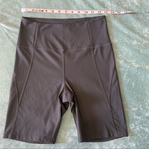 Like New size M Girlfriend Collective high rise bike shorts in granite